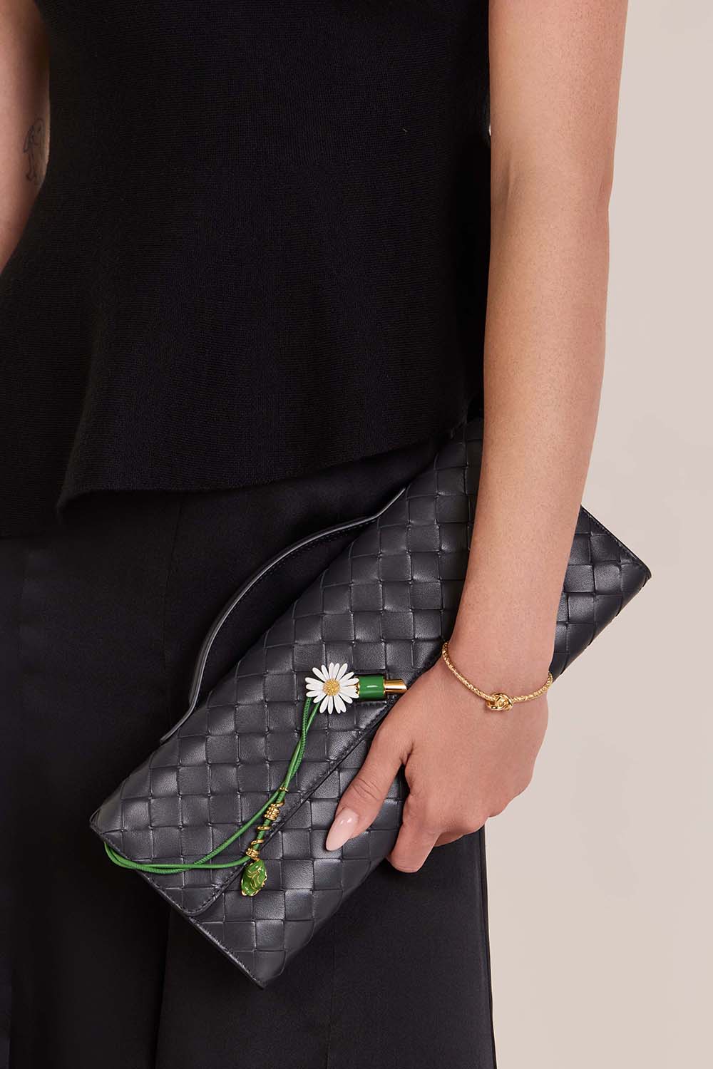 תיק אנדיאמו קלאץ' דייזי